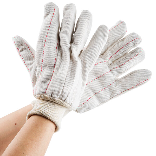 A pair of white Cordova work gloves with red stripes.