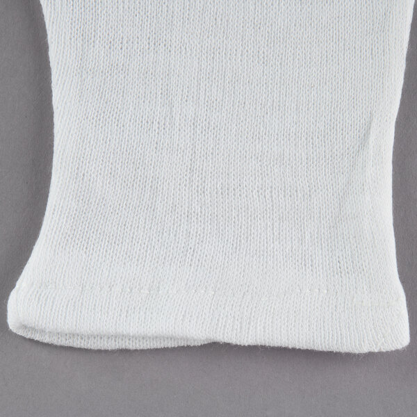 A pair of white Cordova Lisle gloves with a seam.