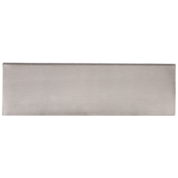 A Tablecraft stainless steel rectangular bowl on a grey surface.