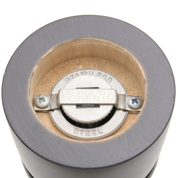 A close up of a Chef Specialties Windsor Ebony Pepper Mill grinder.