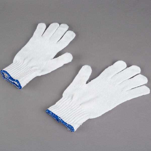 A pair of white Cordova work gloves with blue trim.