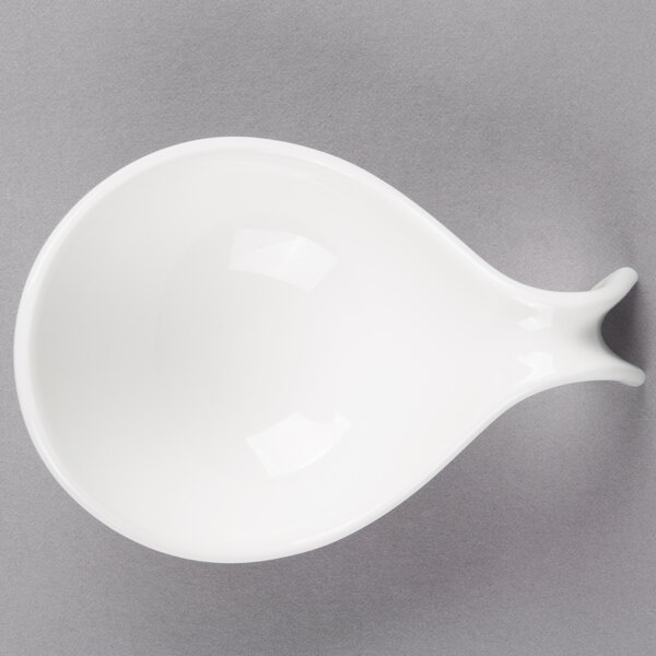 A white Villeroy & Boch porcelain bowl with a small hole in it.