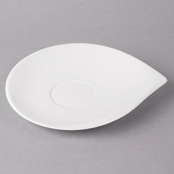 A white Villeroy & Boch porcelain saucer with a small hole in the middle.