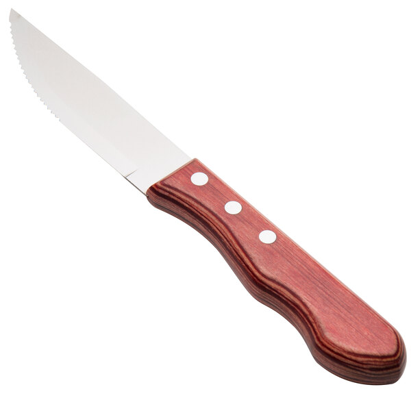 A Walco steak knife with a jumbo Brazil Polywood handle.