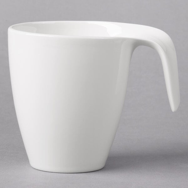 A white Villeroy & Boch porcelain mug with a handle.