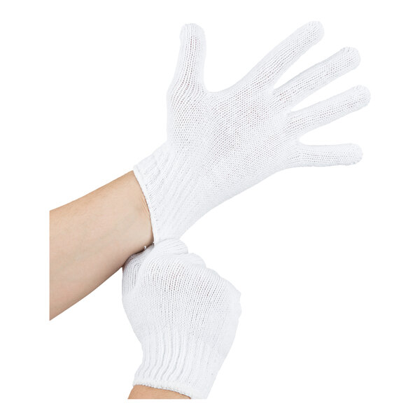A pair of white polyester and cotton work gloves being worn on hands.