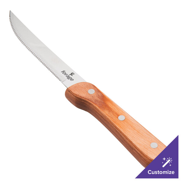 A Walco stainless steel steak knife with a brown Pakka wood handle.