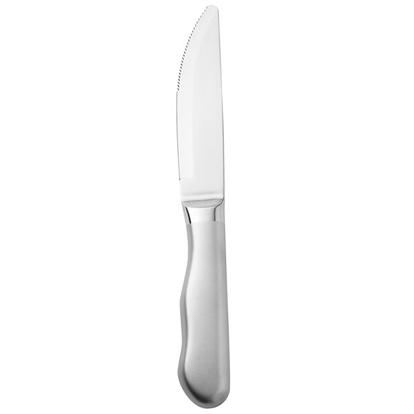 A Walco stainless steel steak knife with a silver handle.
