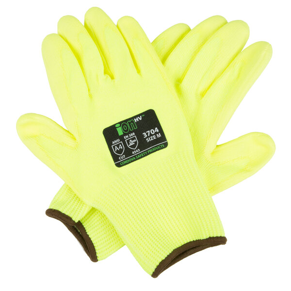 A pair of Cordova medium-sized heavy duty yellow cut resistant gloves with yellow and black palm coating.