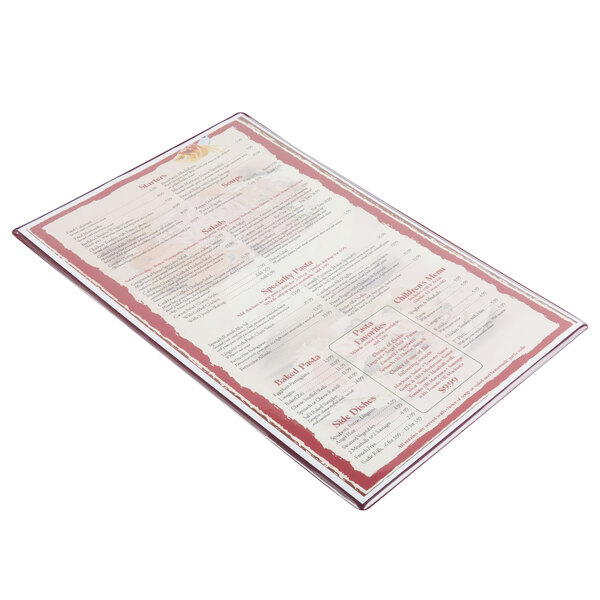 A Menu Solutions Hamilton menu board on a white table with a menu inside.