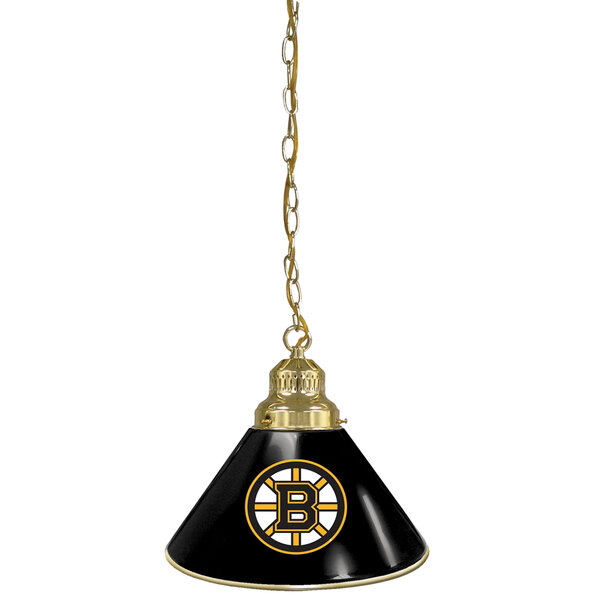 A black and gold lamp shade with a yellow and white Boston Bruins logo.