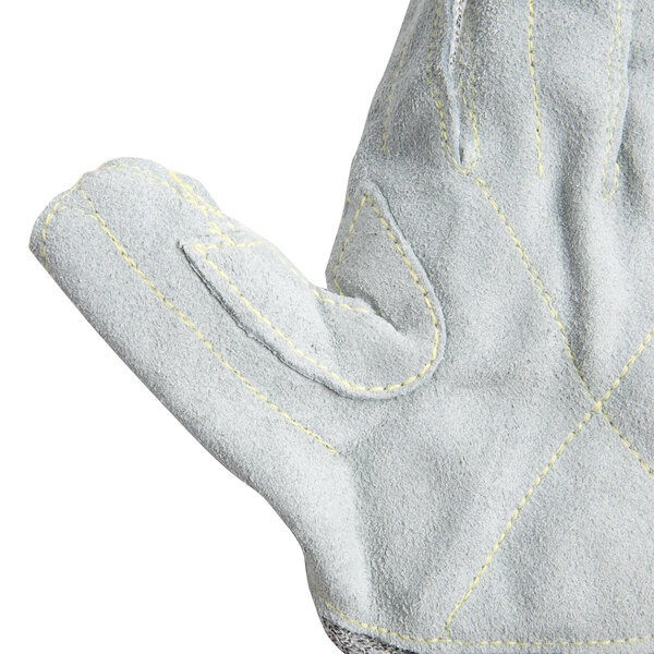 A close up of a pair of Cordova Monarch gray heavy duty work gloves with yellow stitching and split leather palms.