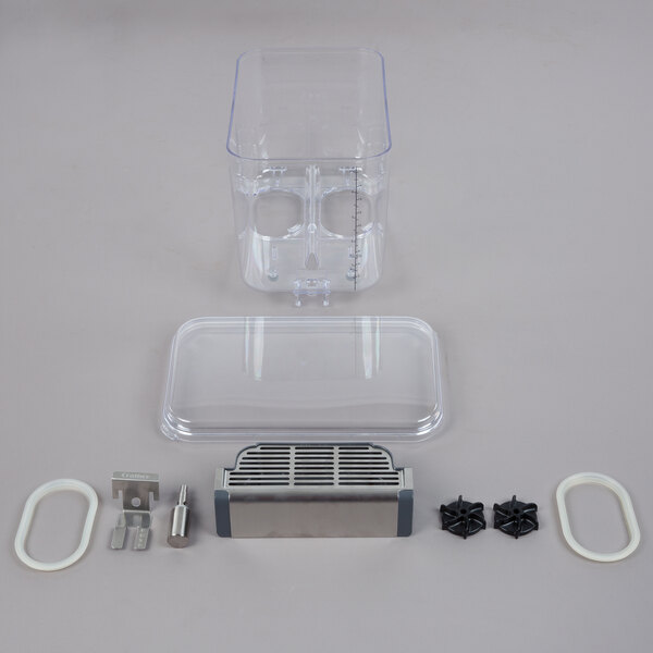 A clear plastic container with holes and a screw.