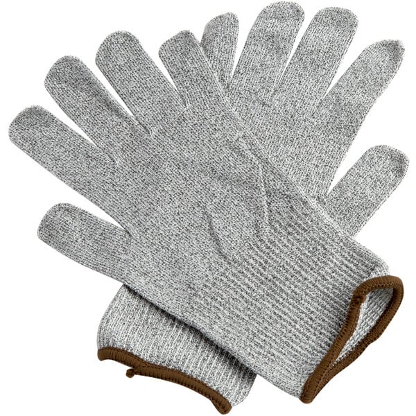 A pair of Cordova Monarch gray engineered fiber cut resistant gloves with brown trim on a white background.