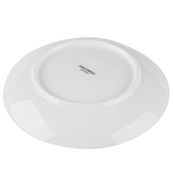 An Arcoroc Candour Azure porcelain B&B plate with a small hole in the middle.