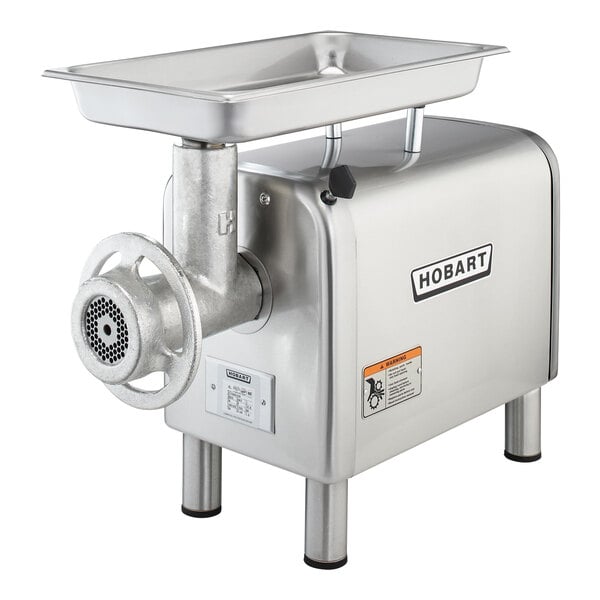 A Hobart meat grinder with a metal tray.