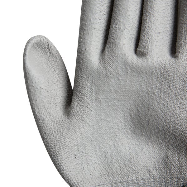 A close-up of a Cordova Monarch gray engineered fiber work glove with gray polyurethane palm coating.