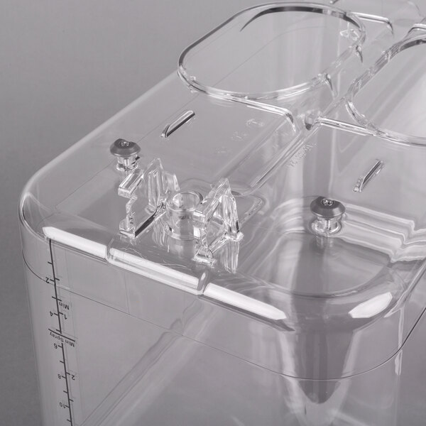 A clear plastic container with a clear lid for a Crathco refrigerated beverage dispenser.