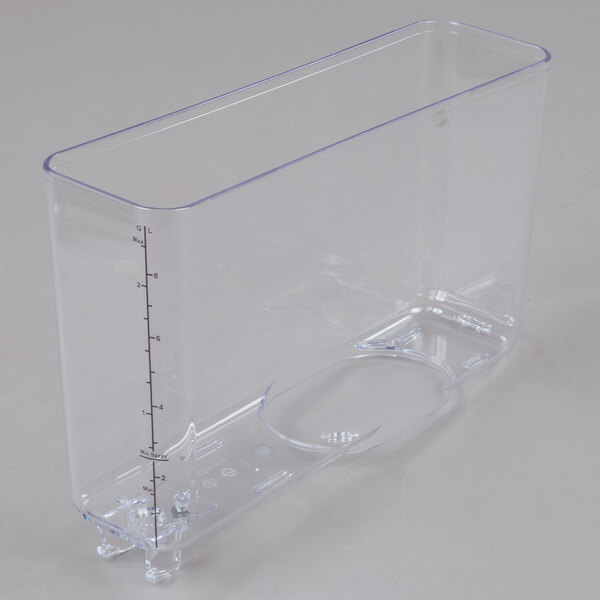 A clear plastic container for a Crathco quadruple refrigerated beverage dispenser.