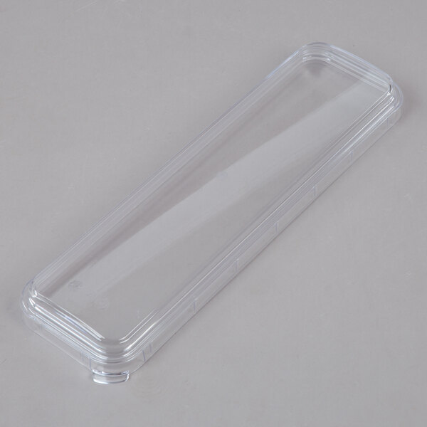 A clear plastic container with a lid for a Crathco refrigerated beverage dispenser.