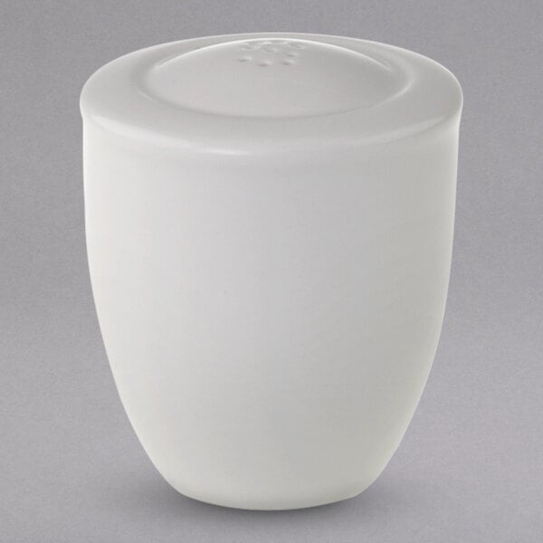 A white Villeroy & Boch porcelain salt shaker with a lid.