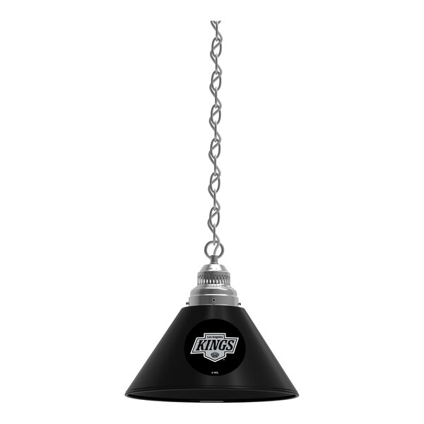A black Holland Bar Stool Los Angeles Kings pendant light with a silver chain.