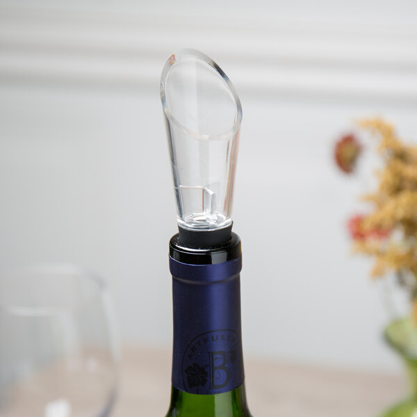 A wine bottle with a Franmara air-flow wine pourer and aerator on top.