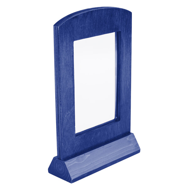 A blue wooden framed menu tent with an angled white base.