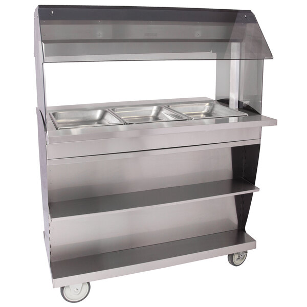 A silver Alto-Shaam hot food cart with three trays inside.