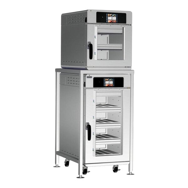 A stacked electric oven package with two stainless steel multi-cook ovens, each featuring a digital control panel and multiple interior shelves.