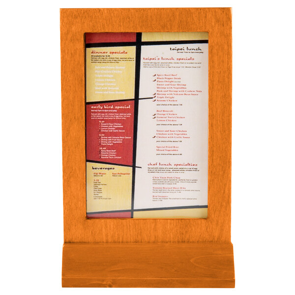 A Menu Solutions wood menu tent with a framed Mandarin menu on a table.