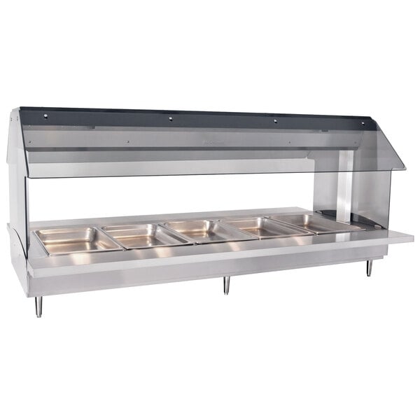 An Alto-Shaam electric hot food buffet table with open top for five pans on a counter.