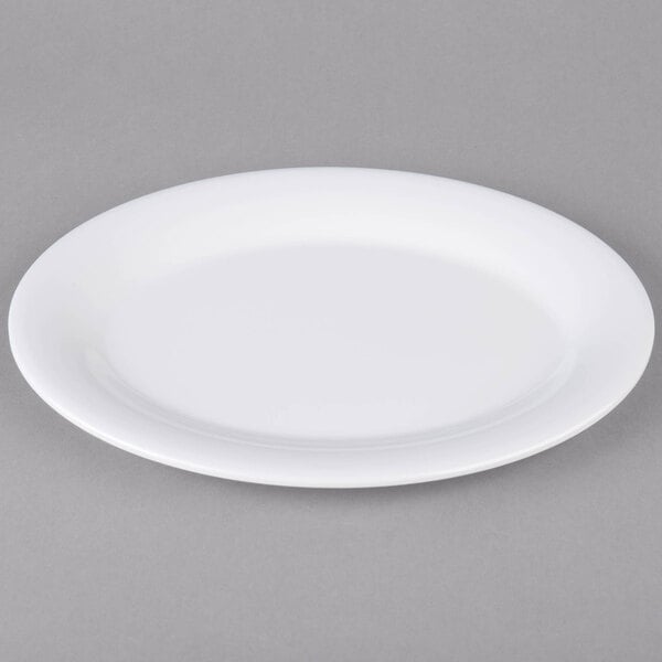 A white oval melamine platter with a white rim.