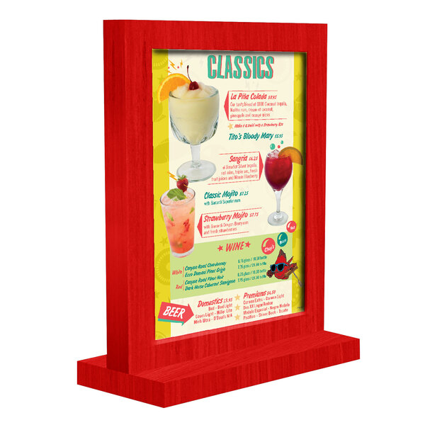 A red wood Menu Solutions table tent with a berry frame.