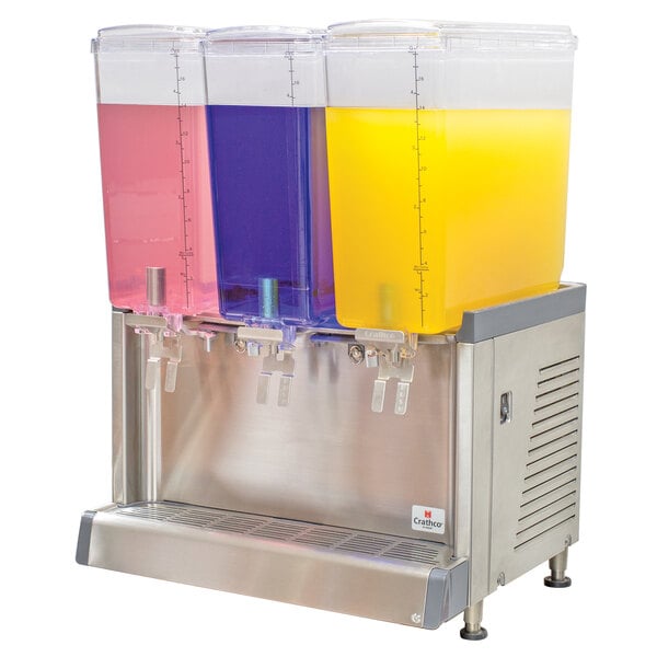 A Crathco refrigerated beverage dispenser with three containers of liquid.