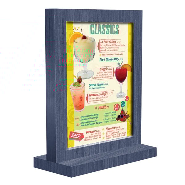 A Menu Solutions denim wood table tent with a drink menu displayed.