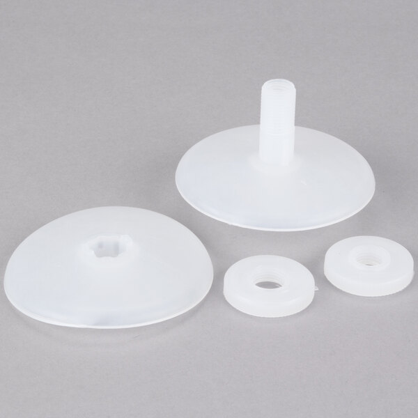 A set of three white plastic Nemco Feeder Discs with a white plastic ring.