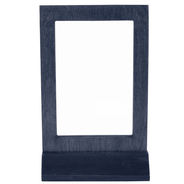 A close-up of a denim framed wood menu tent.