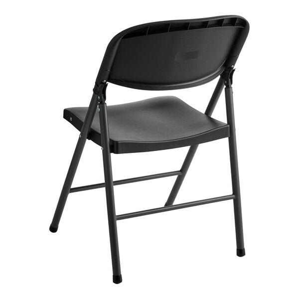 A black contoured injection molded folding chair with a charcoal frame and sage gray legs.
