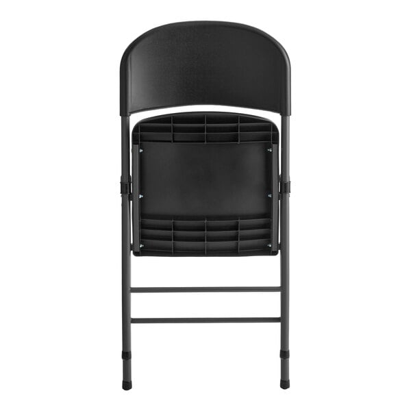 A black contoured injection molded folding chair with a charcoal frame and sage gray legs.
