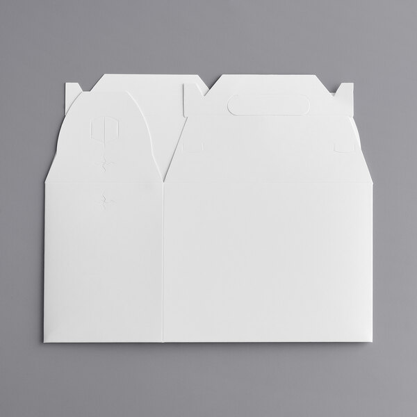 A white barn take-out box with a handle.