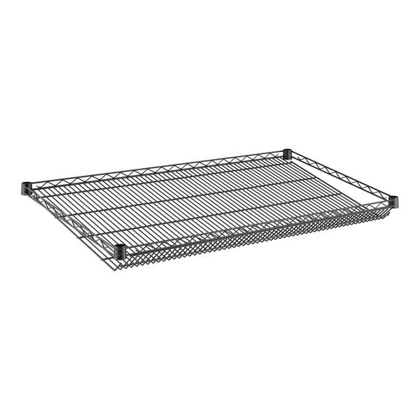 A black wire slanted shelf with a metal grid.