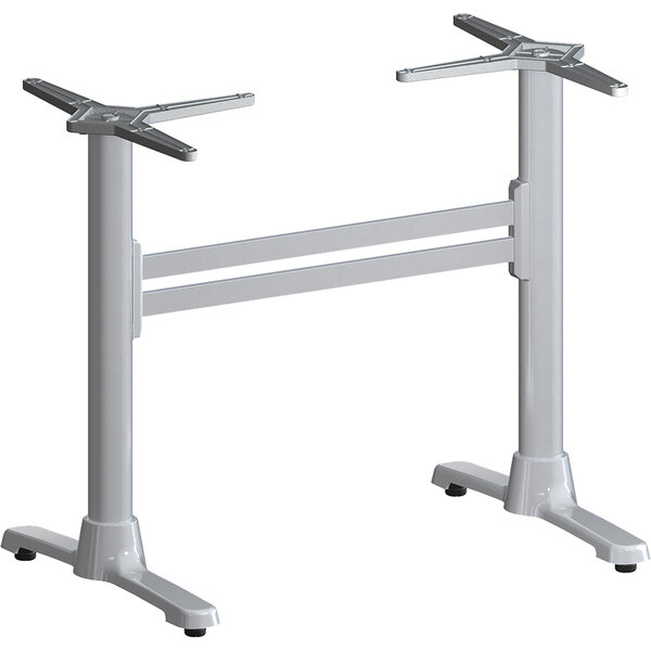 A white FLAT Tech table base with four metal legs.
