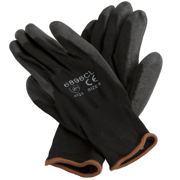 A pair of black Cordova nylon gloves with black polyurethane palms.