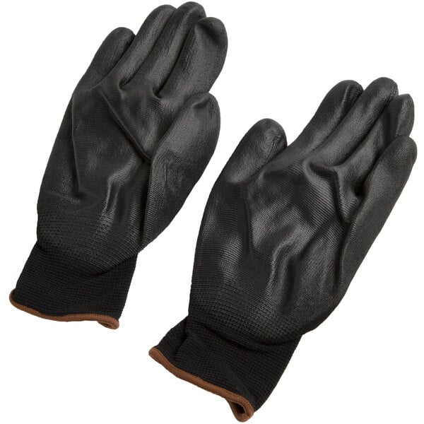A pair of black Cordova warehouse gloves with black polyurethane palms.