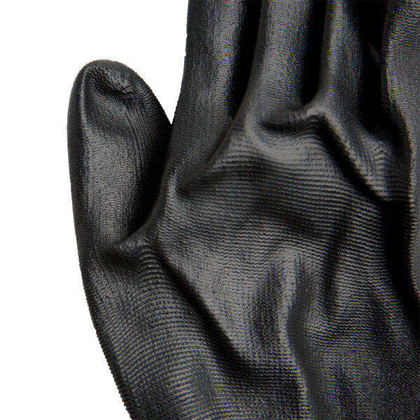 A close up of a Cordova black nylon glove with black polyurethane palm coating.