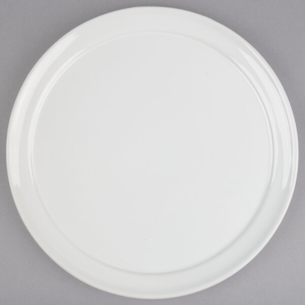 An American Metalcraft white ceramic pizza serving tray with a round rim.