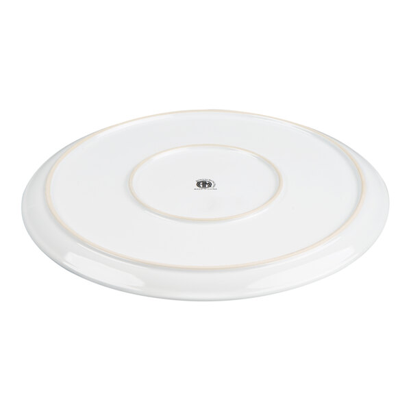 A white, round ceramic tray with a slightly raised center and subtle beige accent lines.