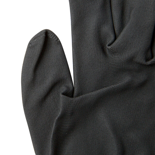 A close up of a Cordova black nylon glove with black foam nitrile coating on the palm.
