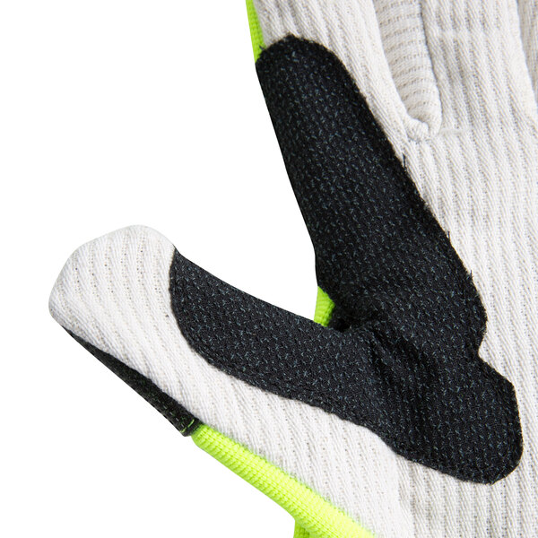 A close up of a pair of Cordova OGRE lime green and black heavy duty work gloves with a canvas palm coating.